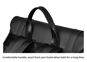 Detail of ergonomic padded handle and reinforced nylon webbing on black commuter backpack
