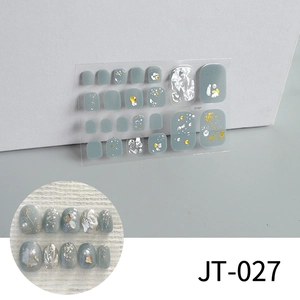 Macro detail of JT-027 3D toe nail stickers with silver glitter and pearl accents