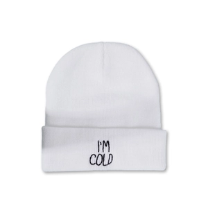 Detail shot of white ribbed knit beanie featuring black I'M COLD letter embroidery