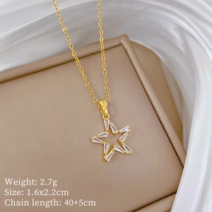 Detail of star pendant with zircon on gold chain including size and weight specs