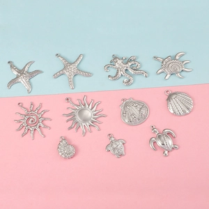 11pcs silver ocean theme pendants including starfish octopus turtle and shell charms