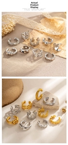 Detailed display of trendy gold and silver C-shaped ear cuffs with textured metal patterns