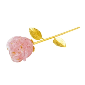 Pink translucent resin rose with gold foil flakes and metallic golden stem on white background