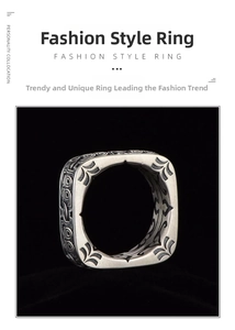 Macro detail of vintage square-round silver ring with intricate ethnic style carvings