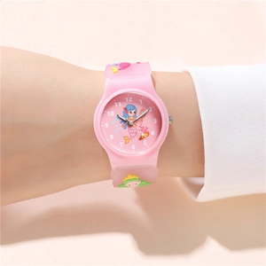 Close-up of pink mermaid kids watch with 3D silicone strap worn on a child wrist