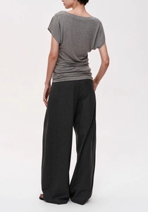 Detail view showing the draped texture and high-quality wool fabric on back of t-shirt