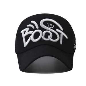 Close-up of white 3D Boost embroidery with smiley face on a black cotton baseball cap