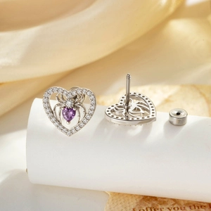 Silver heart spider stud earrings with purple heart gemstone and crystal accents