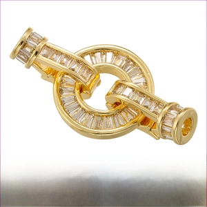 Macro detail of gold-plated heart pearl clasp with pavé cubic zirconia for DIY jewelry