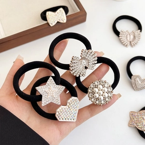 Black elastic hair ties with sparkling rhinestone heart and pearl bow accessories