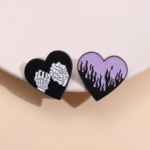 Creative heart-shaped enamel pins set with skull hand and fire wave gothic metal brooches