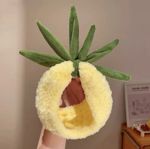 Macro detail of yellow pineapple headband made of absorbent microfiber for face washing
