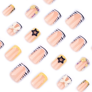 French zebra print press-on nails in short square shape with 3D bows and rhinestones