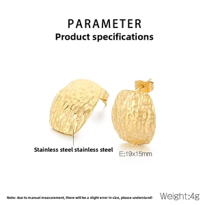 Detailed view of irregular 18k gold plated stainless steel stud earrings with hammered finish
