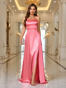 Pink satin halter neck dress with high slit in luxury European palace corridor setting