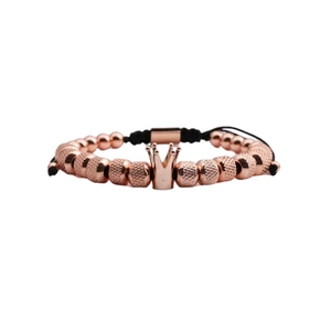 Rose gold crown beaded bracelet with textured round beads and black adjustable cord