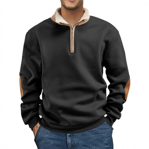 Men's vintage half-zip sweatshirt with brown elbow patches and fleece lining on white background