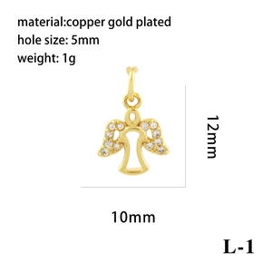 Macro shot of 18K gold plated angel charm with zircon inlay including size measurements