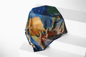 Detail of Van Gogh Cafe Terrace silk scarf draped over a minimalist white geometric stand