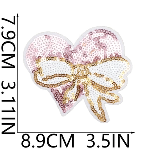 Pink and gold sequin heart bow patch dimensions 8.9x7.9cm displayed on white background