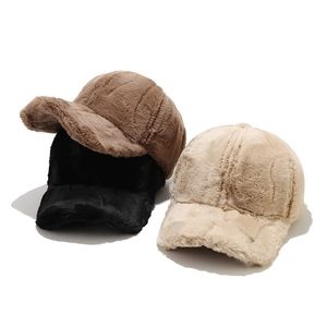 Winter plush baseball caps in black, brown, and beige with soft faux fur texture