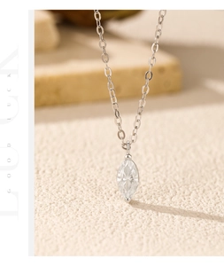Detailed close-up of a marquise-cut Moissanite pendant on a 925 sterling silver chain
