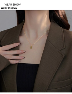 Minimalist gold S925 silver necklace with rectangular letter Y pendant shown on a model