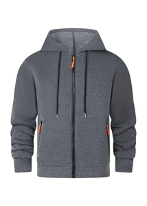 Detail of dark gray fleece jacket with orange zipper pull and knitted texture