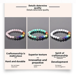 Detailed view of 3-piece beaded bracelets featuring chakra beads and Tree of Life charms