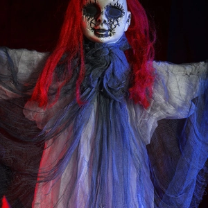 Animated Halloween grim reaper prop with red hair and blue mesh veil in eerie lighting