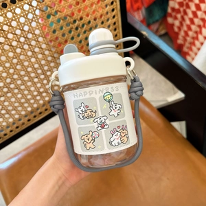 Detail of cute dog pattern on leather sleeve for portable plastic straw water bottle