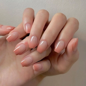 Glossy peach ombre square press-on nails with a minimalist aesthetic and high-shine finish