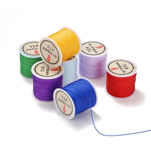 Detailed close-up of colorful 0.8mm polyester cords for DIY jewelry making
