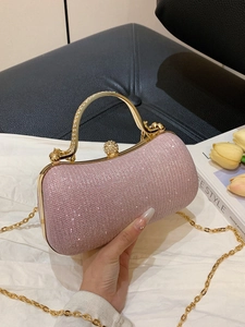 Pink sequin evening bag with gold chain strap and diamond-encrusted buckle handle