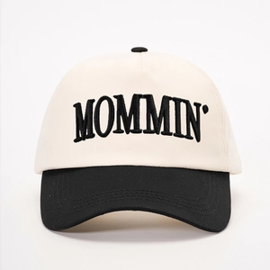 Classic black and white contrast baseball cap with MOMMIN embroidery on front