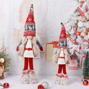 Nordic Christmas gnomes with red plaid hats and reindeer patterns in festive setting