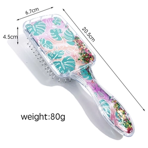 Cute transparent glitter hairbrush with pink monstera leaf design and star sequins
