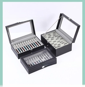 Three premium black leather pen display boxes with transparent windows and metal buckles