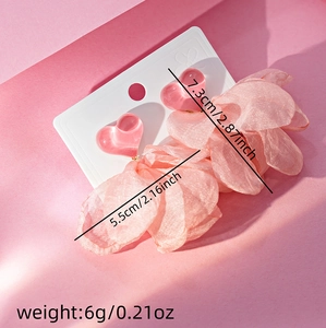 Detailed dimensions of pink lace flower earrings with pearl tassels shown on scale card