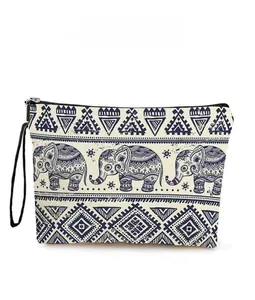 Pochette de maquillage à imprimé éléphant géométrique avec dragonne et motif bleu