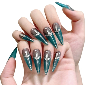 Green gradient stiletto press-on nails with silver metal lines and shiny rhinestones