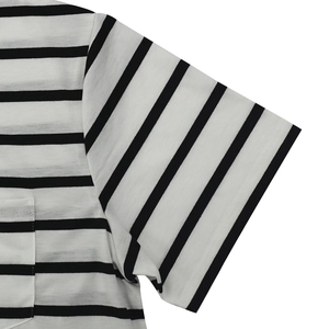 Detailed close-up of striped T-shirt sleeves and chest pocket showing stitching quality