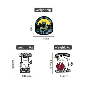 Three cute cartoon cat enamel pins in black white and yellow with humorous quotes