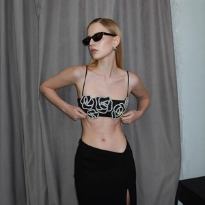 Fashionable black crop top camisole featuring five luxury rhinestone 3D rose appliques