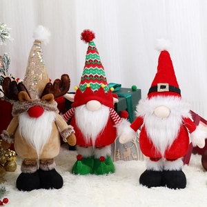 Three Christmas gnomes with retractable legs in reindeer, elf, and Santa styles