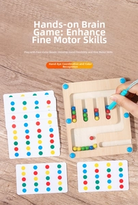 Detailed shot of a child using the magnetic pen on the wooden four-color marble maze toy