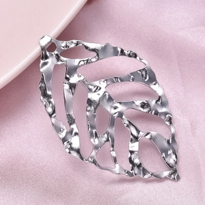 Detailed view of 304 stainless steel leaf pendant with hammered texture and hollowed veins