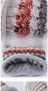 Detailed view of thick knit neck warmer with colorful patterns and grey fleece lining