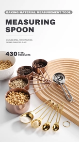 Polished stainless steel measuring cups and spoons on a wooden tray with ingredients