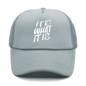 Close-up of grey trucker hat with IT IS WHAT IT IS white print and breathable mesh back